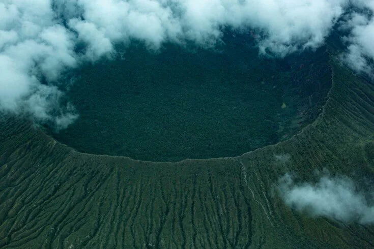 Kenya Safari Destinations 29 Cloud drifting over a forested volcanic crater